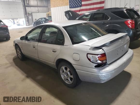 2002 Saturn SL with VIN 1G8ZH52812Z229280, listed as a Copart auction lot 71627905 with 147,279 mi miles and Salvage title. Bid and sale history available at DreamBid. Image 2.