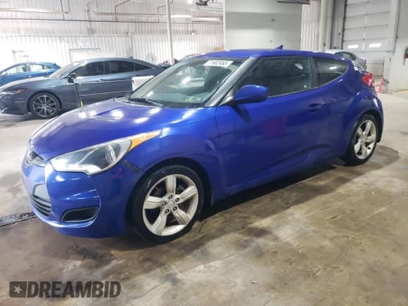 2012 Hyundai Veloster w/Black Int z VIN KMHTC6AD3CU078659, wystawiony jako Copart lot #71902465 z przebiegiem 130 632 mil mil oraz Szkoda całkowita • Salvage title. Historia ofert i sprzedaży dostępna na DreamBid. Obrazek 1.