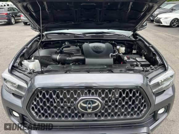 2022 Toyota Tacoma Limited с VIN 3TMGZ5AN7NM458988, выставлен на аукционе Copart как лот 65398105 с пробегом 32 115 миль миль и Списание • Salvage title. История ставок и продаж доступна на DreamBid. Изображение 8.