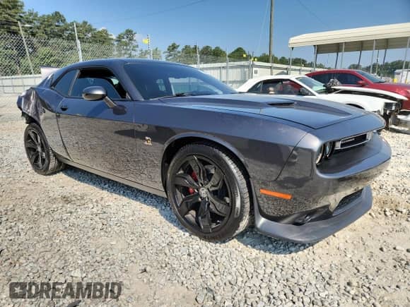 2018 Dodge Challenger R/T Scat Pack с VIN 2C3CDZFJ5JH142125, выставлен на аукционе Copart как лот 71885115 с пробегом 68 767 миль миль и Списание • Salvage title. История ставок и продаж доступна на DreamBid. Изображение 4.