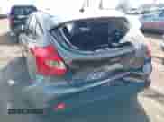 2014 Ford Focus Titanium z VIN 1FADP3N29EL438598, wystawiony jako IAAI lot #43374118 z przebiegiem 110 255 mil mil oraz . Historia ofert i sprzedaży dostępna na DreamBid. Obrazek 14.