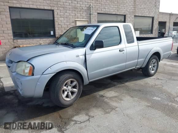2003 Nissan Frontier XE z VIN 1N6DD26T63C436421, wystawiony jako IAAI lot #41551766 z przebiegiem 217 194 mil mil oraz . Historia ofert i sprzedaży dostępna na DreamBid. Obrazek 2.