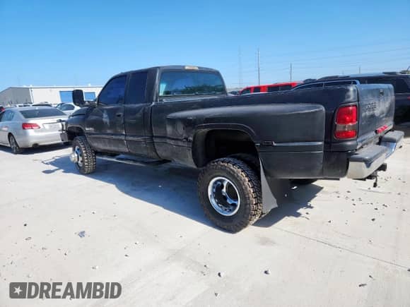 2002 Dodge 3500 с VIN 3B7MF33C02M205826, выставлен на аукционе Copart как лот 66634055 с пробегом 197 913 миль миль и Чистый • Clean title. История ставок и продаж доступна на DreamBid. Изображение 2.