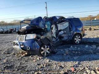 2014 Honda Pilot Touring z VIN 5FNYF4H99EB042039, wystawiony jako Copart lot #89622115 z przebiegiem Nie podano mil oraz Szkoda całkowita • Salvage title. Historia ofert i sprzedaży dostępna na DreamBid. Obrazek 1.