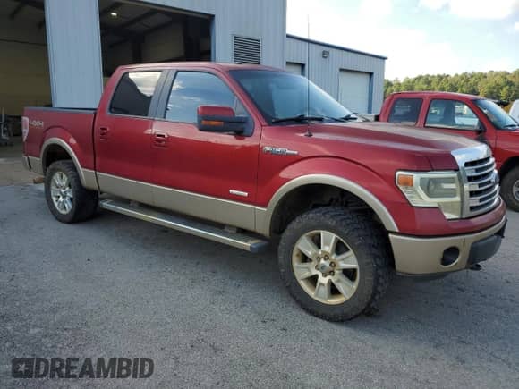 2013 Ford F-150 Lariat with VIN 1FTFW1ET3DKF78539, listed as a Copart auction lot 90242315 with 184,594 mi miles and Clean title. Bid and sale history available at DreamBid. Image 4.