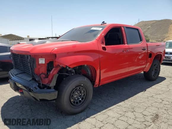 2024 Chevrolet Silverado 1500 Custom Trail Boss with VIN 3GCUDCEDXRG108945, listed as a Copart auction lot 57270235 with 10,551 mi miles and Salvage title. Bid and sale history available at DreamBid. Image 1.