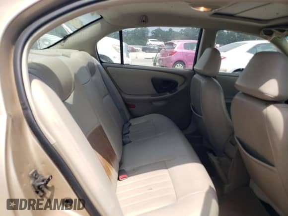 2003 Chevrolet Malibu LS z VIN 1G1NE52JX3M656822, wystawiony jako Copart lot #68388524 z przebiegiem 161 222 mil mil oraz Szkoda całkowita • Salvage title. Historia ofert i sprzedaży dostępna na DreamBid. Obrazek 10.