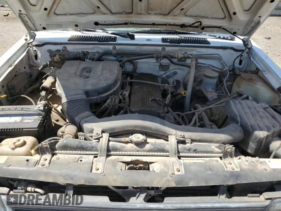 1992 Nissan Frontier XE with VIN 1N6SD11S5NC351492, listed as a Copart auction lot 69573075 with 245,280 mi miles and Salvage title. Bid and sale history available at DreamBid. Image 11.