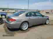 2002 BMW 7 Series 745i with VIN WBAGL634X2DP59674, listed as a Copart auction lot 69068845 with 190,469 mi miles and Salvage title. Bid and sale history available at DreamBid. Image 3.