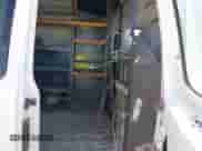 2003 Ford Econoline Cargo with VIN 1FTNE24L93HC07550, listed as a IAAI auction lot 42146707 with 227,224 mi miles and . Bid and sale history available at DreamBid. Image 8.