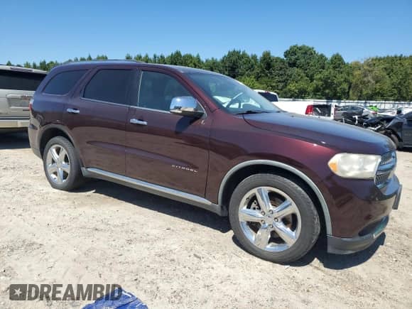2012 Dodge Durango Citadel with VIN 1C4RDHEG0CC130055, listed as a Copart auction lot 70484864 with 134,662 mi miles and Salvage title. Bid and sale history available at DreamBid. Image 4.
