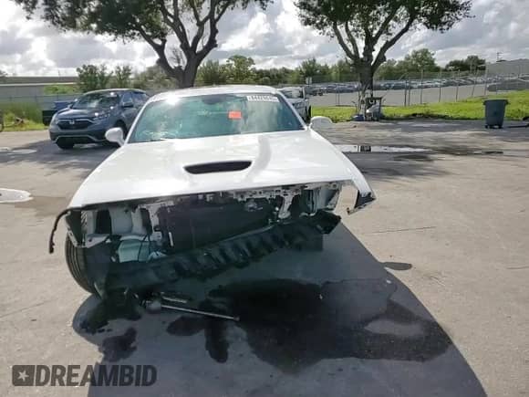 2021 Dodge Challenger GT с VIN 2C3CDZJGXMH564682, выставлен на аукционе Copart как лот 84429845 с пробегом 64 668 миль миль и На запчасти • Non repairable. История ставок и продаж доступна на DreamBid. Изображение 13.