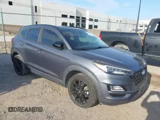 2019 Hyundai Tucson Sport z VIN KM8J33AL6KU999253, wystawiony jako IAAI lot #42736446 z przebiegiem 63 857 mil mil oraz . Historia ofert i sprzedaży dostępna na DreamBid. Obrazek 1.