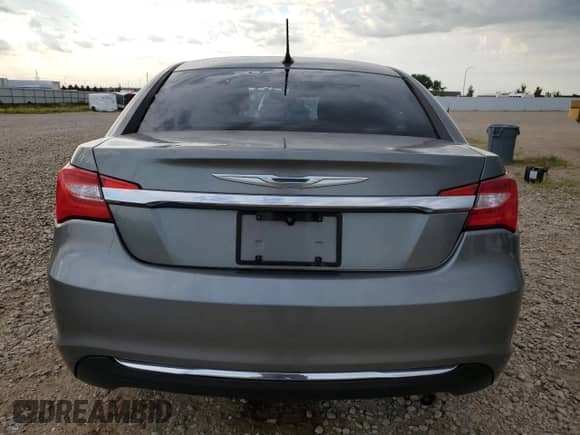 2013 Chrysler 200 Touring with VIN 1C3CCBBB8DN762620, listed as a Copart auction lot 68827495 with 130,834 mi miles and Salvage title. Bid and sale history available at DreamBid. Image 6.