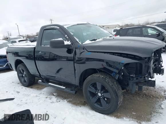 2014 Ram 1500 Express z VIN 3C6JR7AT0EG153404, wystawiony jako IAAI lot #41483525 z przebiegiem 112 077 mil mil oraz . Historia ofert i sprzedaży dostępna na DreamBid. Obrazek 13.