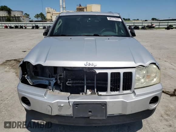 2007 Jeep Grand Cherokee Laredo z VIN 1J8GS48K67C661359, wystawiony jako Copart lot #58337855 z przebiegiem 169 674 mil mil oraz Szkoda całkowita • Salvage title. Historia ofert i sprzedaży dostępna na DreamBid. Obrazek 5.