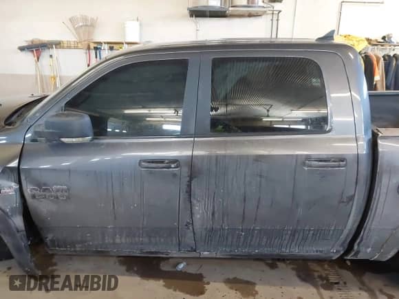 2018 Ram 1500 Rebel with VIN 1C6RR7YT1JS234777, listed as a IAAI auction lot 41409525 with 119,497 mi miles and . Bid and sale history available at DreamBid. Image 14.