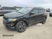 2019 Jeep Compass Altitude with VIN 3C4NJCBB2KT706637, listed as a Copart auction lot 86140265 with 161,415 mi miles and Salvage title. Bid and sale history available at DreamBid. Image 1.