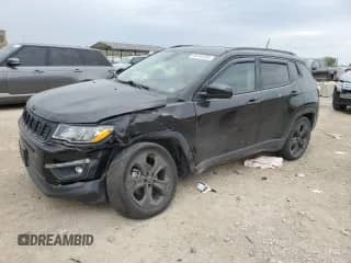 2019 Jeep Compass Altitude with VIN 3C4NJCBB2KT706637, listed as a Copart auction lot 86140265 with 161,415 mi miles and Salvage title. Bid and sale history available at DreamBid. Image 1.
