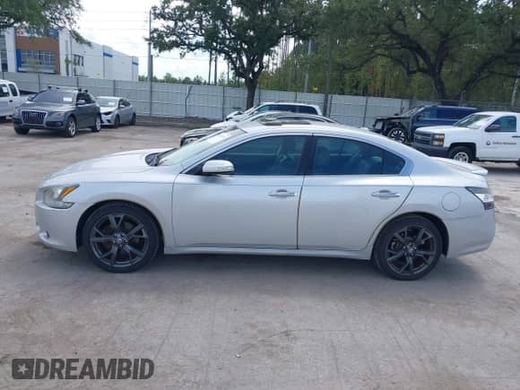 2014 Nissan Maxima S z VIN 1N4AA5APXEC444170, wystawiony jako IAAI lot #43251311 z przebiegiem 243 605 mil mil oraz . Historia ofert i sprzedaży dostępna na DreamBid. Obrazek 14.