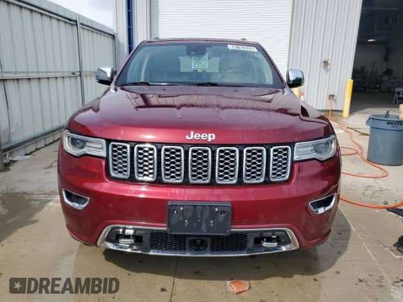 2018 Jeep Grand Cherokee Overland z VIN 1C4RJFCG2JC458039, wystawiony jako Copart lot #68192835 z przebiegiem 134 115 mil mil oraz Czysty tytuł • Clean title. Historia ofert i sprzedaży dostępna na DreamBid. Obrazek 5.