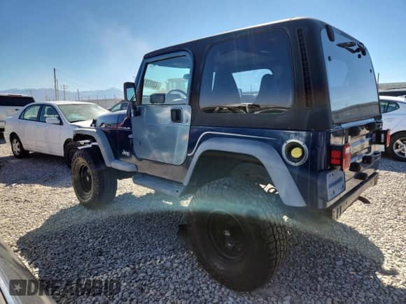 2001 Jeep Wrangler SE with VIN 1J4FA29PX1P372693, listed as a Copart auction lot 83862835 with 132,933 mi miles and Clean title. Bid and sale history available at DreamBid. Image 2.