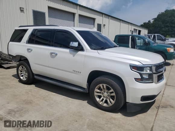 2017 Chevrolet Tahoe LT with VIN 1GNSCBKCXHR171503, listed as a Copart auction lot 66634415 with 195,010 mi miles and Salvage title. Bid and sale history available at DreamBid. Image 4.