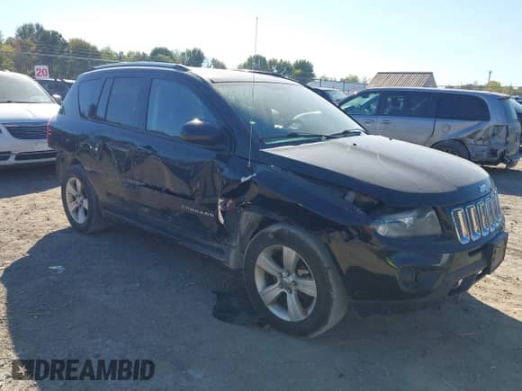 2014 Jeep Compass Latitude with VIN 1C4NJDEB8ED661117, listed as a IAAI auction lot 43368488 with 74,122 mi miles and . Bid and sale history available at DreamBid. Image 1.