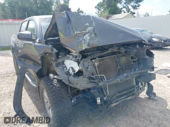 2017 Toyota Tacoma SR5 with VIN 5TFAZ5CN9HX050378, listed as a IAAI auction lot 42245477 with 158,431 mi miles and . Bid and sale history available at DreamBid. Image 6.