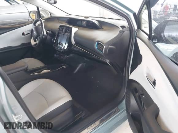 2016 Toyota Prius Four z VIN JTDKARFU9G3024875, wystawiony jako IAAI lot #42314235 z przebiegiem 101 383 mil mil oraz . Historia ofert i sprzedaży dostępna na DreamBid. Obrazek 5.