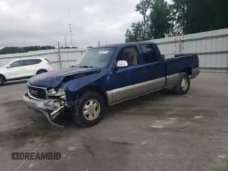 2000 GMC Sierra 1500 SLE with VIN 2GTEC19V0Y1240165, listed as a Copart auction lot 69354735 with 243,472 mi miles and Salvage title. Bid and sale history available at DreamBid. Image 1.