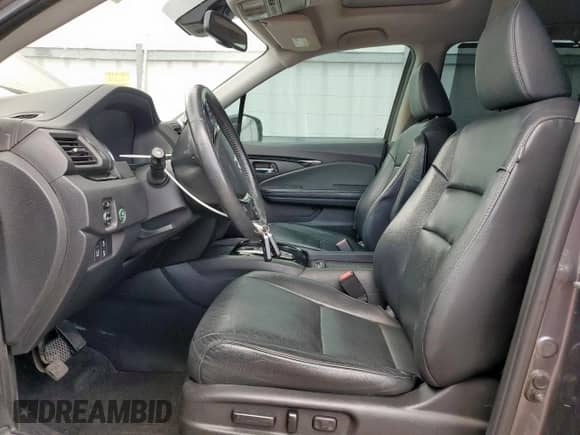 2017 Honda Pilot Touring с VIN 5FNYF5H99HB006569, выставлен на аукционе Copart как лот 70750315 с пробегом 64 275 миль миль и Списание • Salvage title. История ставок и продаж доступна на DreamBid. Изображение 7.