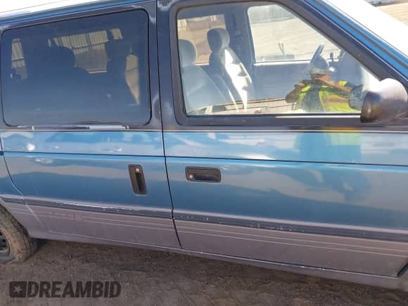1993 Dodge Grand Caravan with VIN 1B4GH54R3PX606744, listed as a IAAI auction lot 42135204 with 159,517 mi miles and . Bid and sale history available at DreamBid. Image 12.