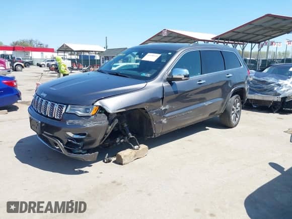 2017 Jeep Grand Cherokee Overland with VIN 1C4RJFCG0HC602990, listed as a IAAI auction lot 41998539 with 170,640 mi miles and . Bid and sale history available at DreamBid. Image 20.