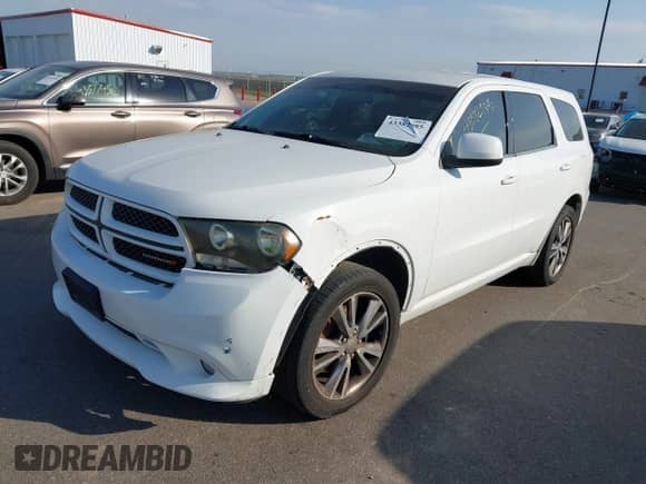 2013 Dodge Durango SXT with VIN 1C4RDJAG4DC688683, listed as a IAAI auction lot 43382985 with 205,928 mi miles and . Bid and sale history available at DreamBid. Image 18.