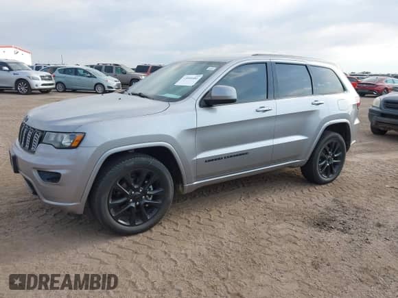 2017 Jeep Grand Cherokee Laredo with VIN 1C4RJFAGXHC892576, listed as a IAAI auction lot 43054481 with 74,031 mi miles and . Bid and sale history available at DreamBid. Image 2.