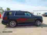 2015 Chevrolet Tahoe LT with VIN 1GNSKBKC9FR158211, listed as a IAAI auction lot 43094500 with 221,133 mi miles and . Bid and sale history available at DreamBid. Image 12.