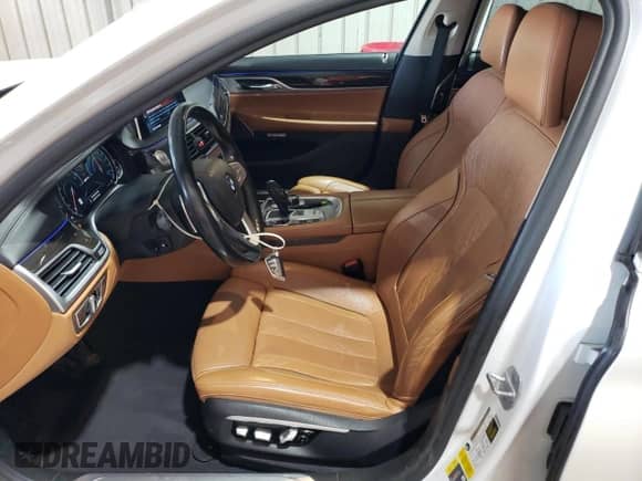 2017 BMW 7 Series 740e xDrive with VIN WBA7J2C38HG497960, listed as a Copart auction lot 58901035 with 128,262 mi miles and Salvage title. Bid and sale history available at DreamBid. Image 7.