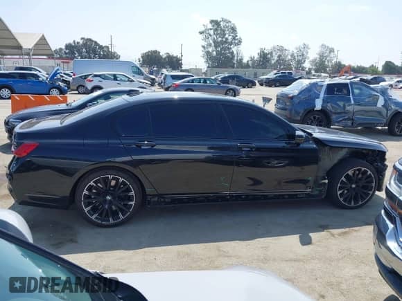 2021 BMW 7 Series 750i xDrive with VIN WBA7U2C04MCG45569, listed as a IAAI auction lot 42349642 with 52,652 mi miles and . Bid and sale history available at DreamBid. Image 14.
