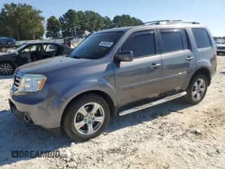 2014 Honda Pilot EX with VIN 5FNYF3H40EB005282, listed as a Copart auction lot 80303255 with 124,157 mi miles and Salvage title. Bid and sale history available at DreamBid. Image 1.