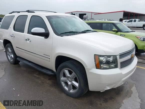 2012 Chevrolet Tahoe LTZ z VIN 1GNSCCE06CR305746, wystawiony jako IAAI lot #41852437 z przebiegiem 198 372 mil mil oraz . Historia ofert i sprzedaży dostępna na DreamBid. Obrazek 1.