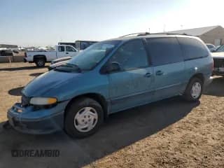 1999 Dodge Caravan SE with VIN 2B4GP44G2XR423118, listed as a Copart auction lot 71740135 with 133,543 mi miles and Salvage title. Bid and sale history available at DreamBid. Image 1.