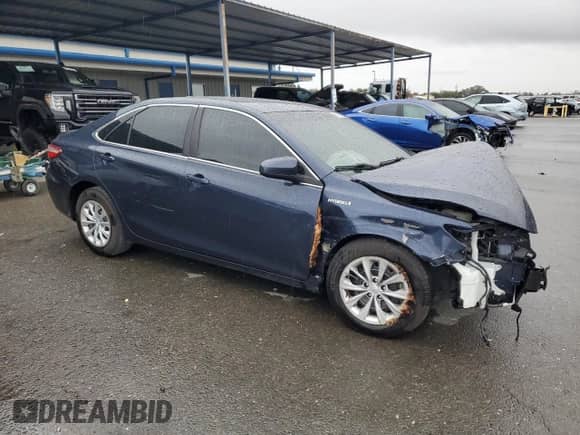 2015 Toyota Camry LE с VIN 4T1BD1FKXFU155048, выставлен на аукционе Copart как лот 86591395 с пробегом 61 004 миль миль и Списание • Salvage title. История ставок и продаж доступна на DreamBid. Изображение 4.