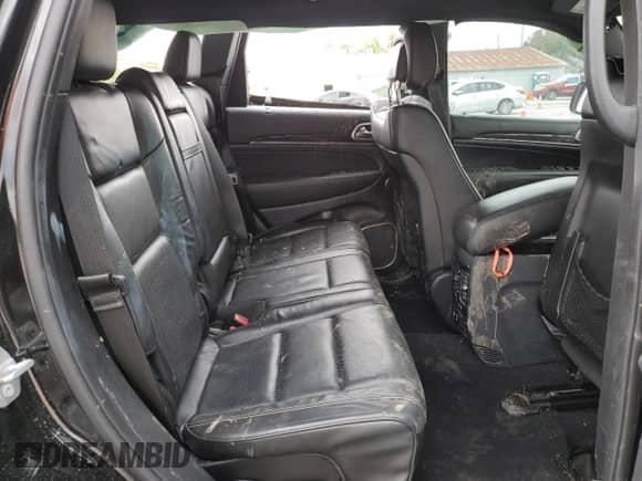2017 Jeep Grand Cherokee Overland with VIN 1C4RJFCG7HC684748, listed as a Copart auction lot 81811815 with 72,945 mi miles and Salvage title. Bid and sale history available at DreamBid. Image 11.