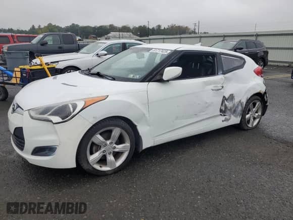 2013 Hyundai Veloster w/Black Int z VIN KMHTC6AD6DU180586, wystawiony jako Copart lot #81717425 z przebiegiem 91 070 mil mil oraz Szkoda całkowita • Salvage title. Historia ofert i sprzedaży dostępna na DreamBid. Obrazek 1.