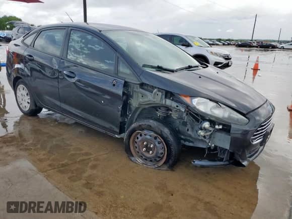 2014 Ford Fiesta S z VIN 3FADP4AJ0EM171546, wystawiony jako Copart lot #64717405 z przebiegiem 102 603 mil mil oraz Czysty tytuł • Clean title. Historia ofert i sprzedaży dostępna na DreamBid. Obrazek 4.