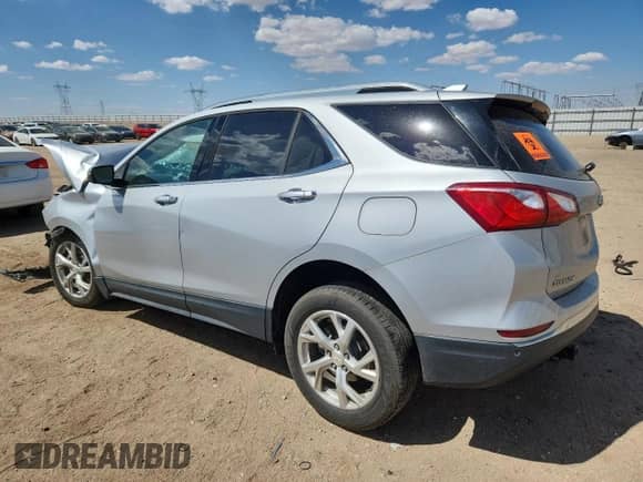 2020 Chevrolet Equinox Premier с VIN 2GNAXXEV4L6210973, выставлен на аукционе Copart как лот 71746895 с пробегом 78 876 миль миль и Списание • Salvage title. История ставок и продаж доступна на DreamBid. Изображение 2.