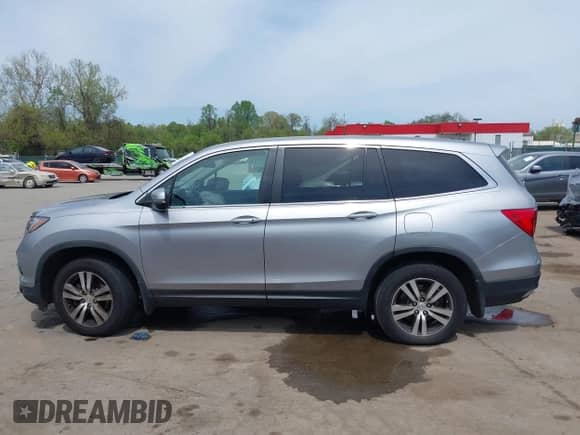 2016 Honda Pilot EX-L z VIN 5FNYF6H74GB110521, wystawiony jako IAAI lot #42091614 z przebiegiem 81 600 mil mil oraz . Historia ofert i sprzedaży dostępna na DreamBid. Obrazek 13.