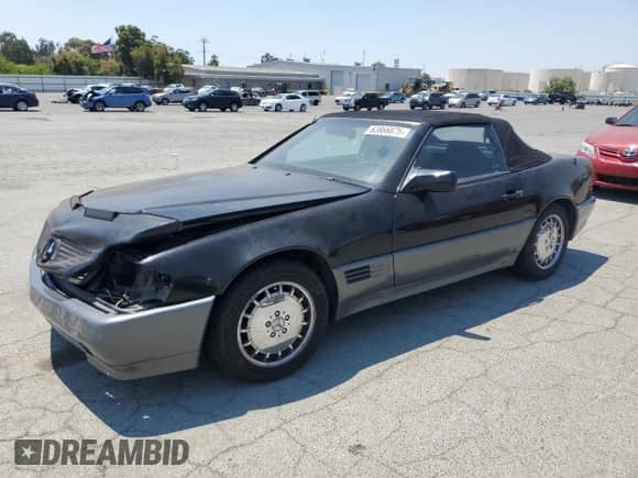 1992 Mercedes-Benz 500 z VIN WDBFA66E0NF040854, wystawiony jako Copart lot #63866875 z przebiegiem 144 606 mil mil oraz Szkoda całkowita • Salvage title. Historia ofert i sprzedaży dostępna na DreamBid. Obrazek 1.