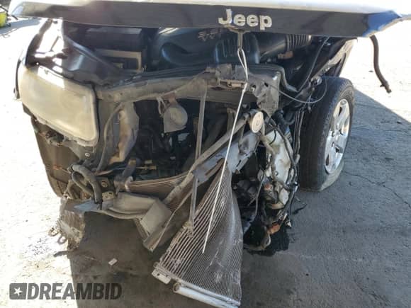 2013 Jeep Grand Cherokee Limited с VIN 1C4RJEBG2DC656944, выставлен на аукционе Copart как лот 82191405 с пробегом Не указан миль и Списание • Salvage title. История ставок и продаж доступна на DreamBid. Изображение 12.